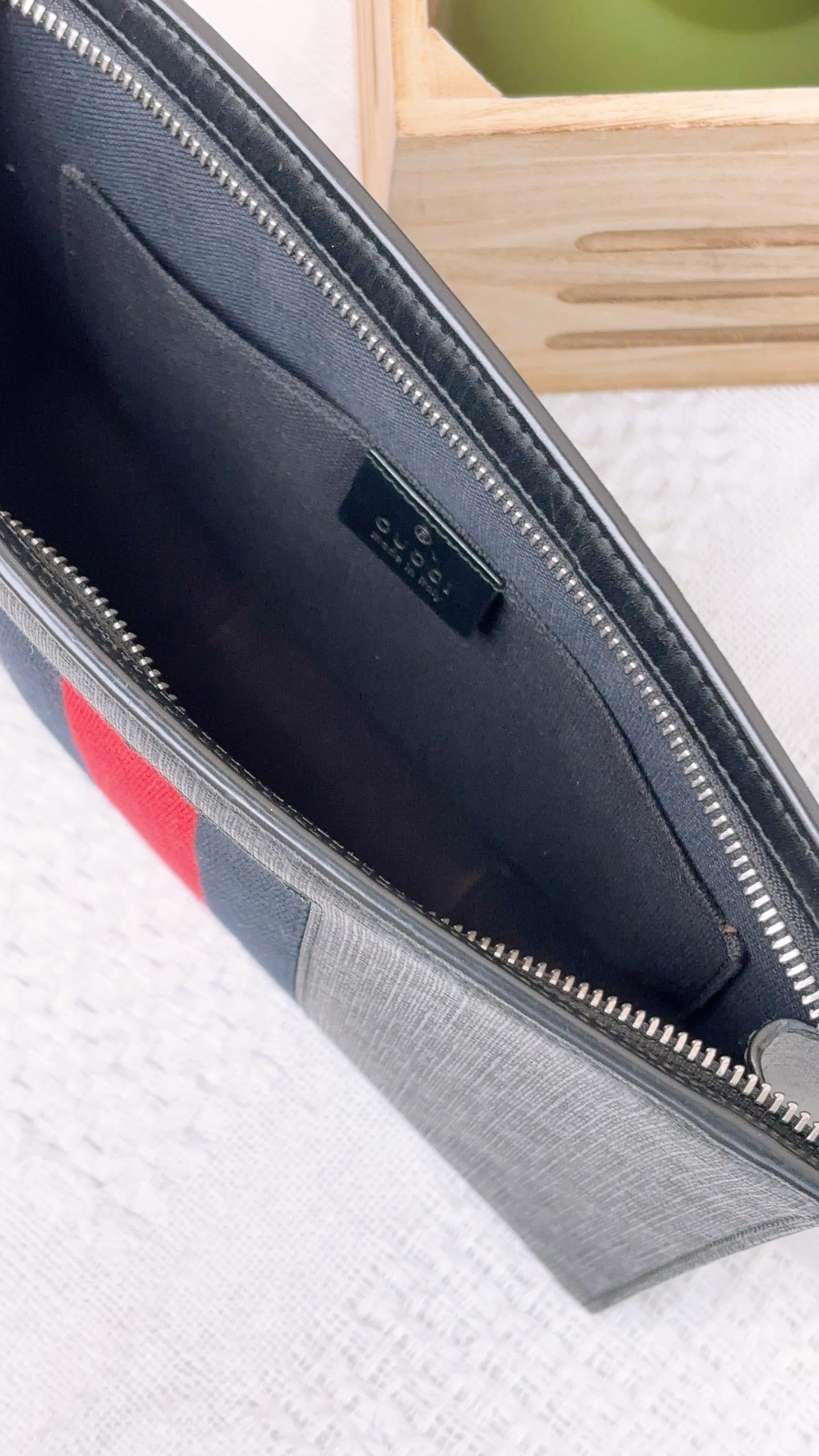 Gucci Black GG Supreme Pouch