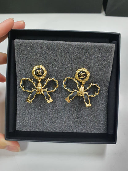 Chanel Chain Leather Bow Earrings