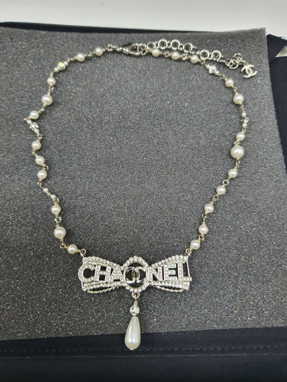 Chanel CC Silver Diamante Bow Pearl Necklace