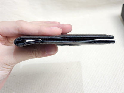 Chanel Black Calfskin Timeless Passport Holder