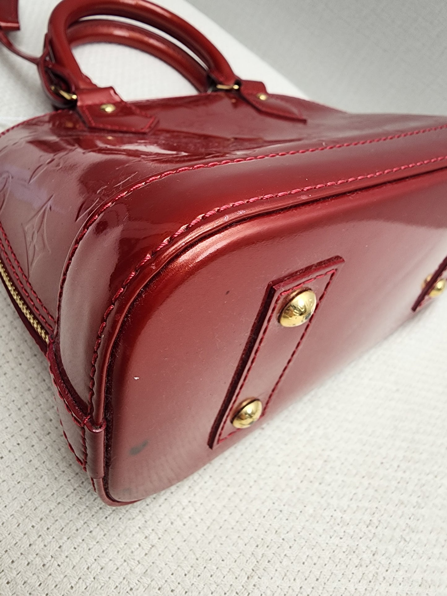 LV Red Vernis Alma BB