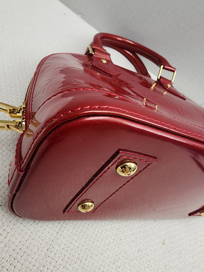 LV Red Vernis Alma BB