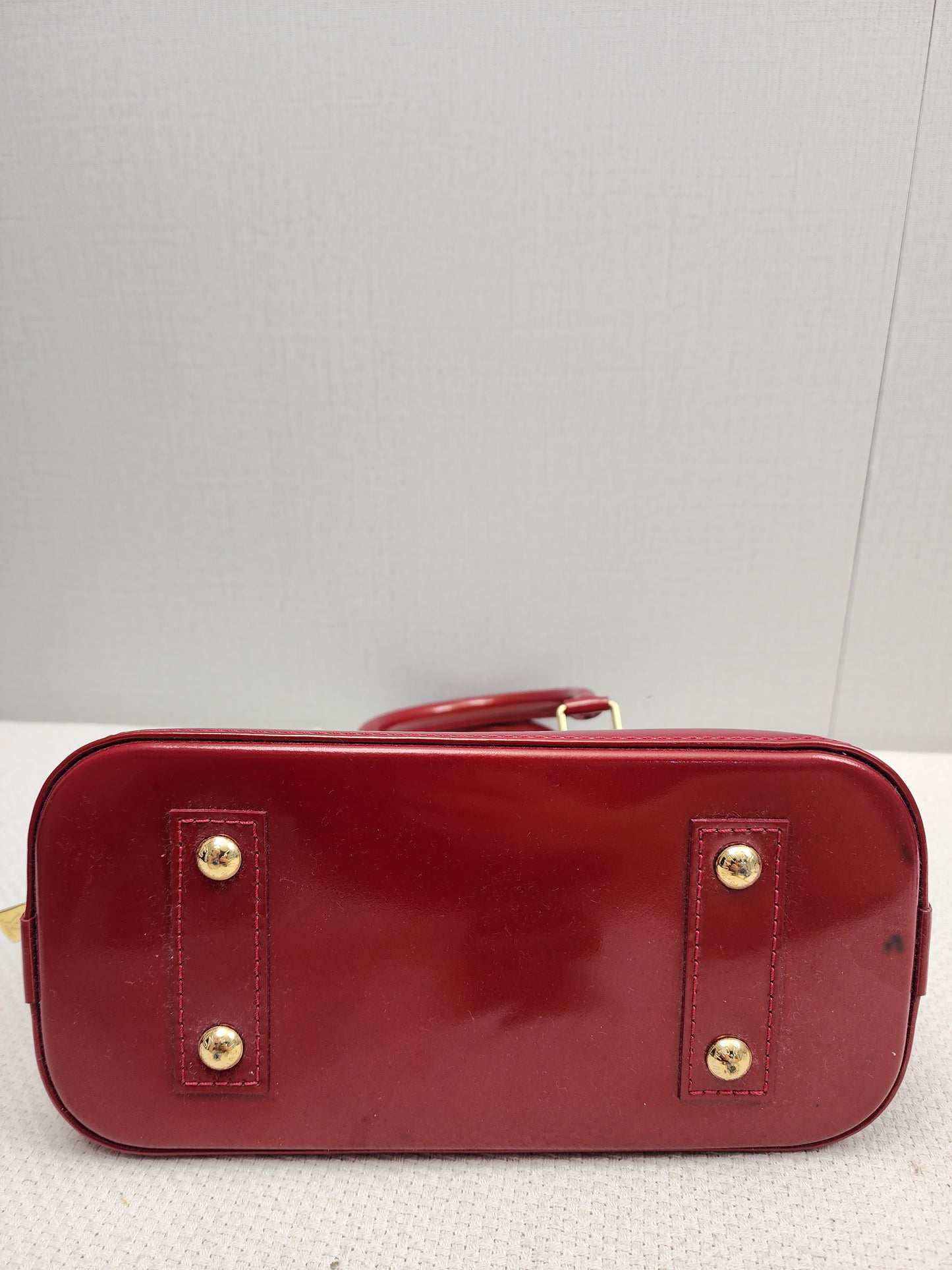 LV Red Vernis Alma BB