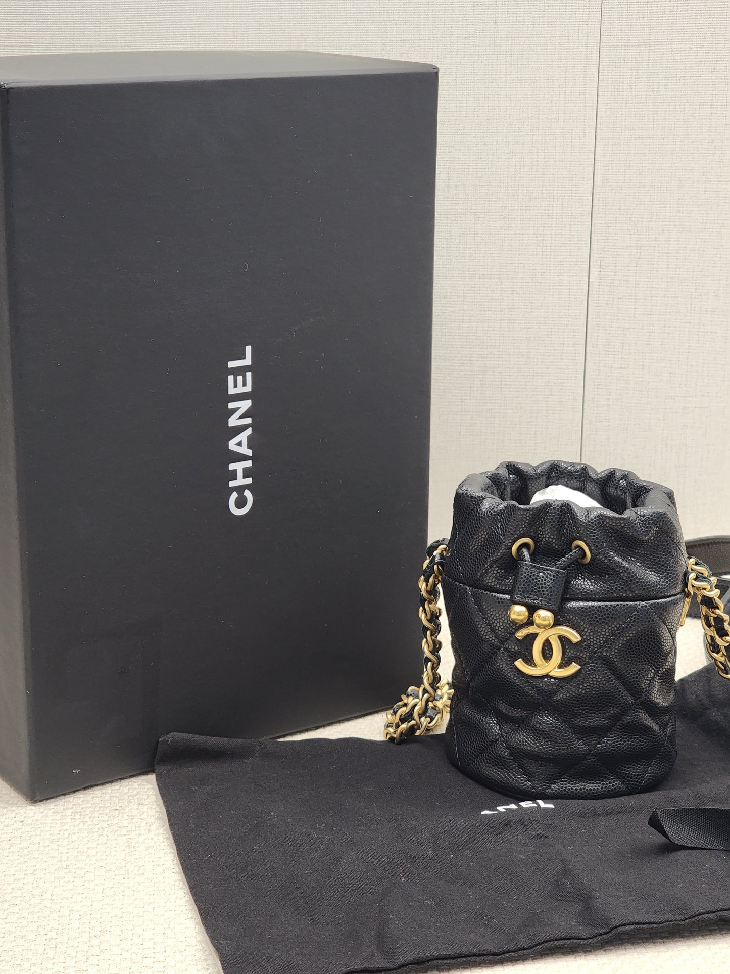 Chanel Black Caviar 22A Thist Your Button Micro Bucket
