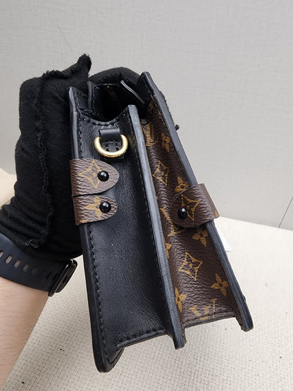LV Reverse Monogram Trunk Clutch on Chain