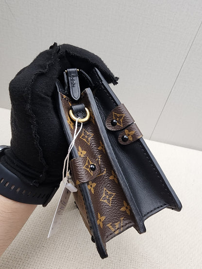LV Reverse Monogram Trunk Clutch on Chain