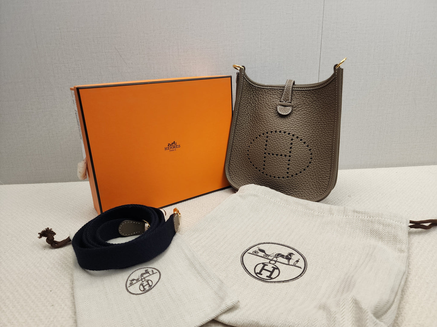 Hermes Etoupe x Bleu Indigo Mini Evelyne (GHW)