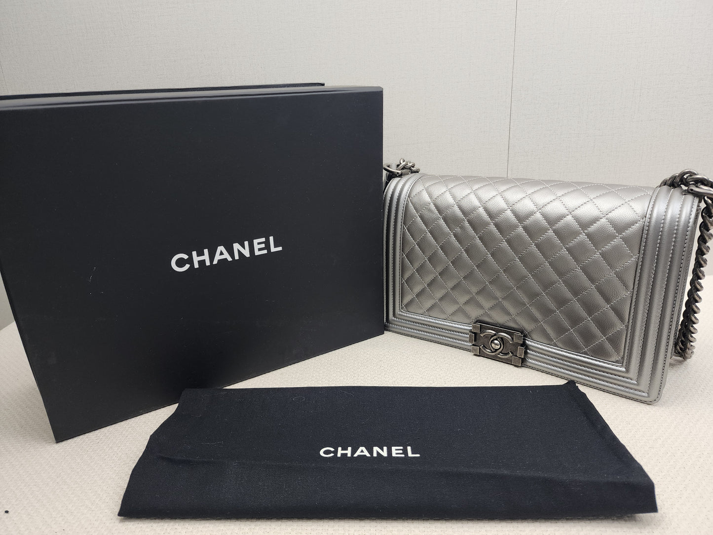 Chanel Metallic Silver Caviar New Medium Boy (RHW)