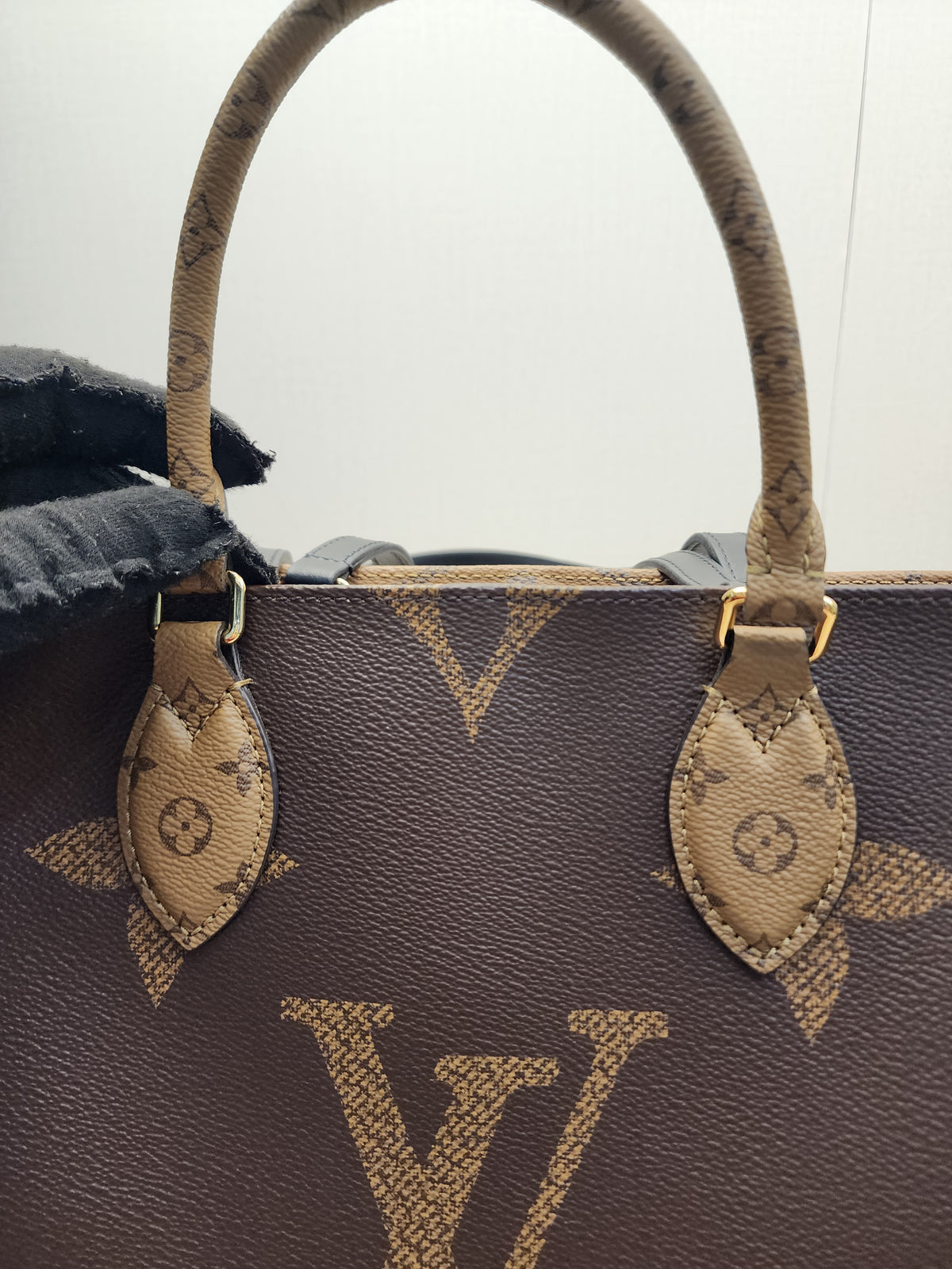 LV Reverse Monogram On The Go MM
