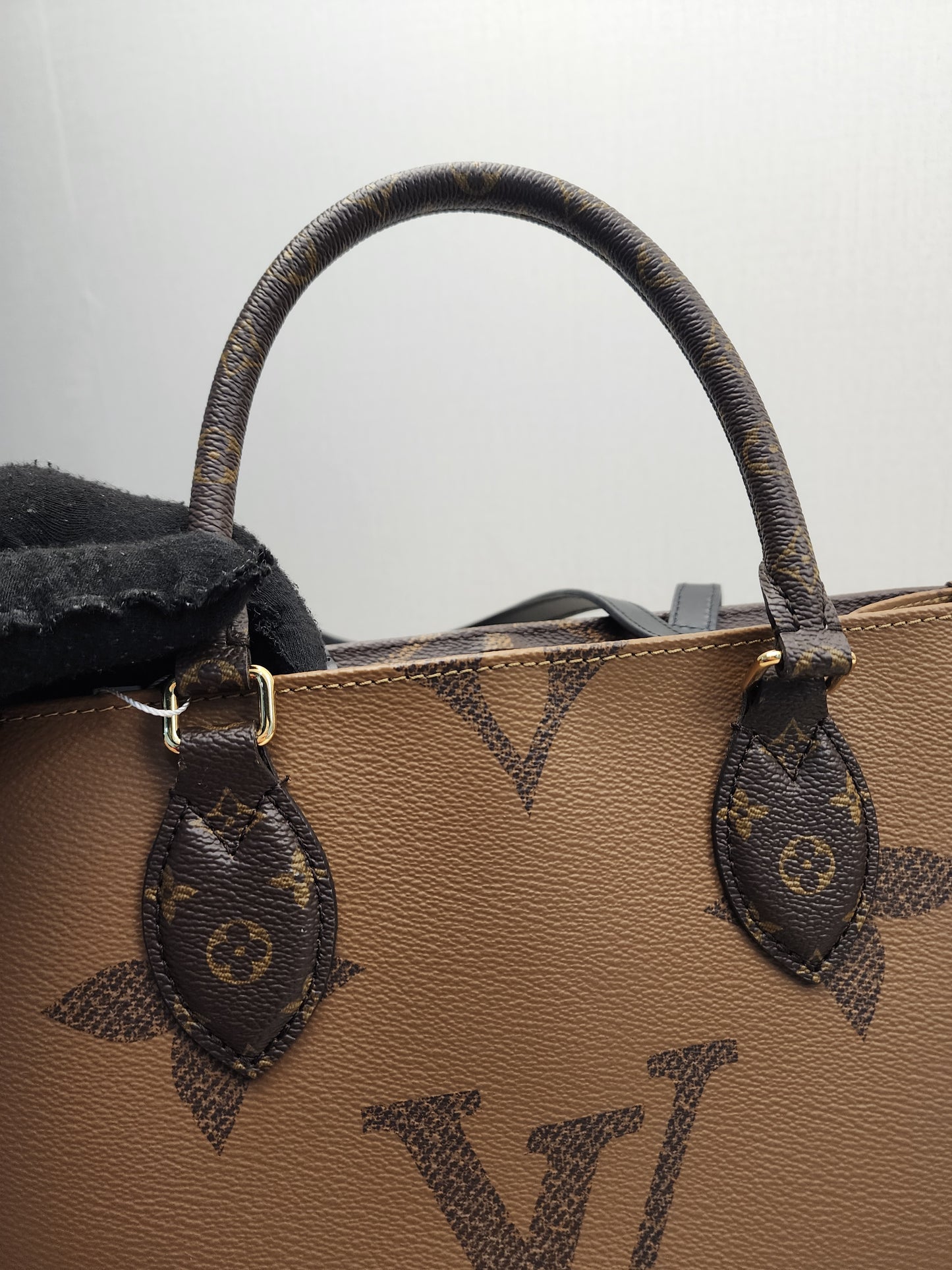 LV Reverse Monogram On The Go MM