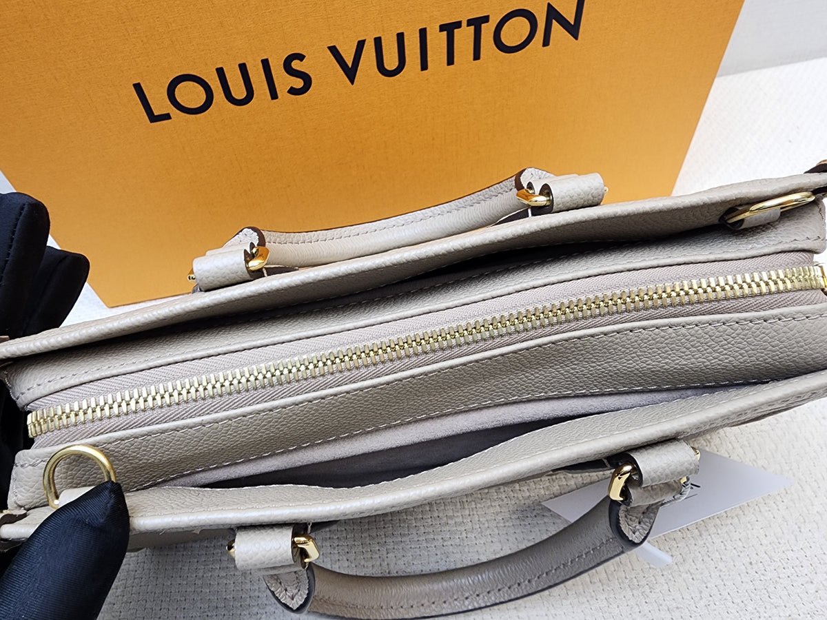 LV Toutrelle / Creme Empreinte On The Go East West