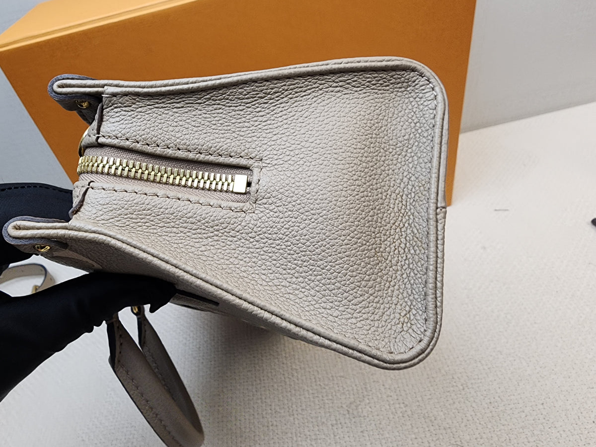 LV Toutrelle / Creme Empreinte On The Go East West