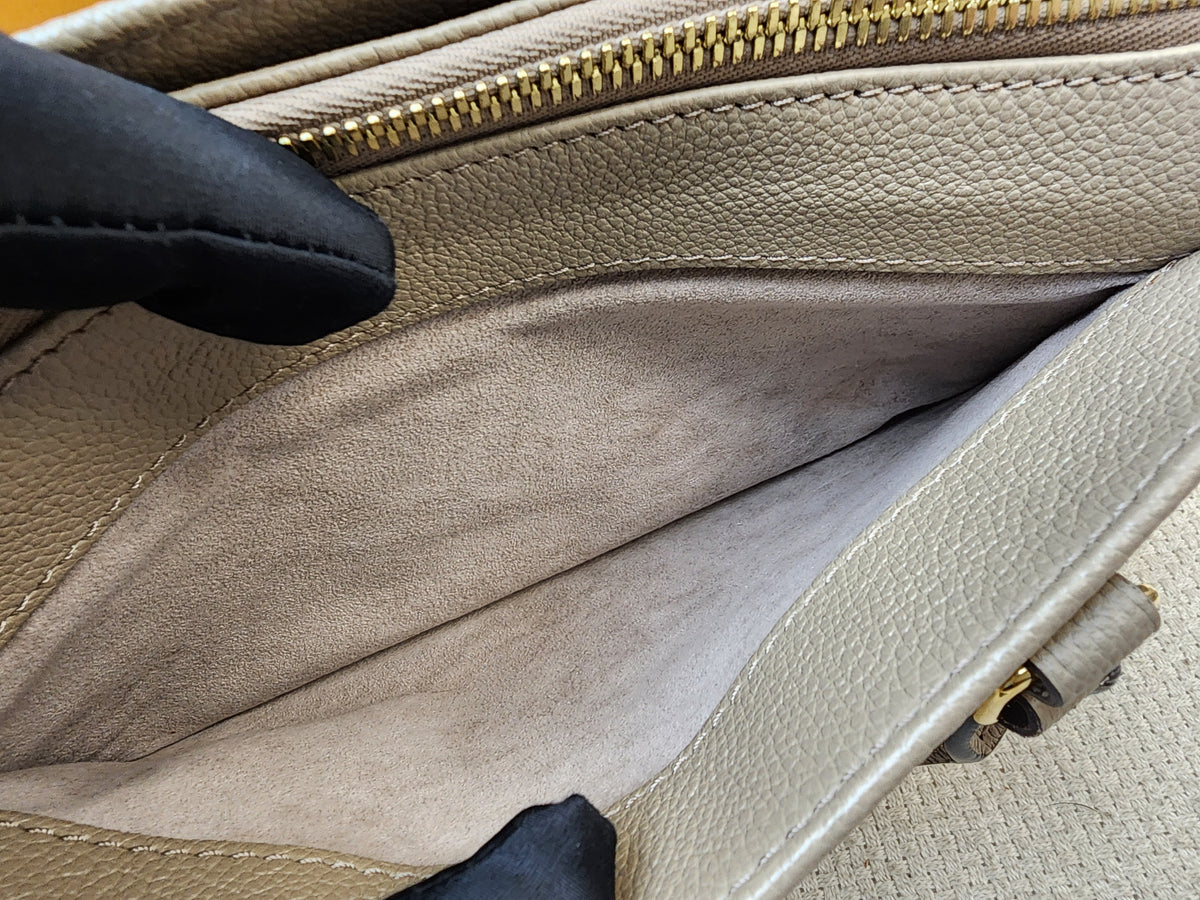 LV Toutrelle / Creme Empreinte On The Go East West