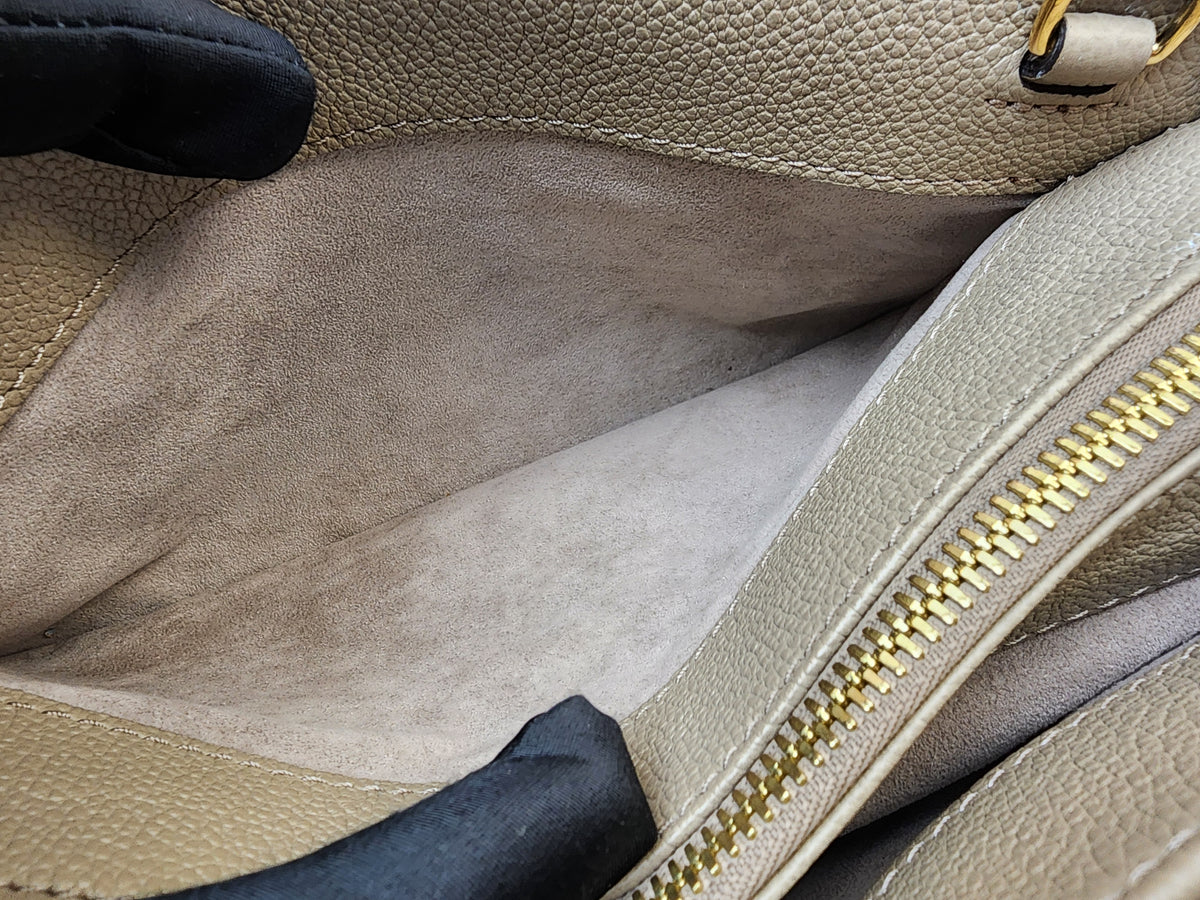 LV Toutrelle / Creme Empreinte On The Go East West