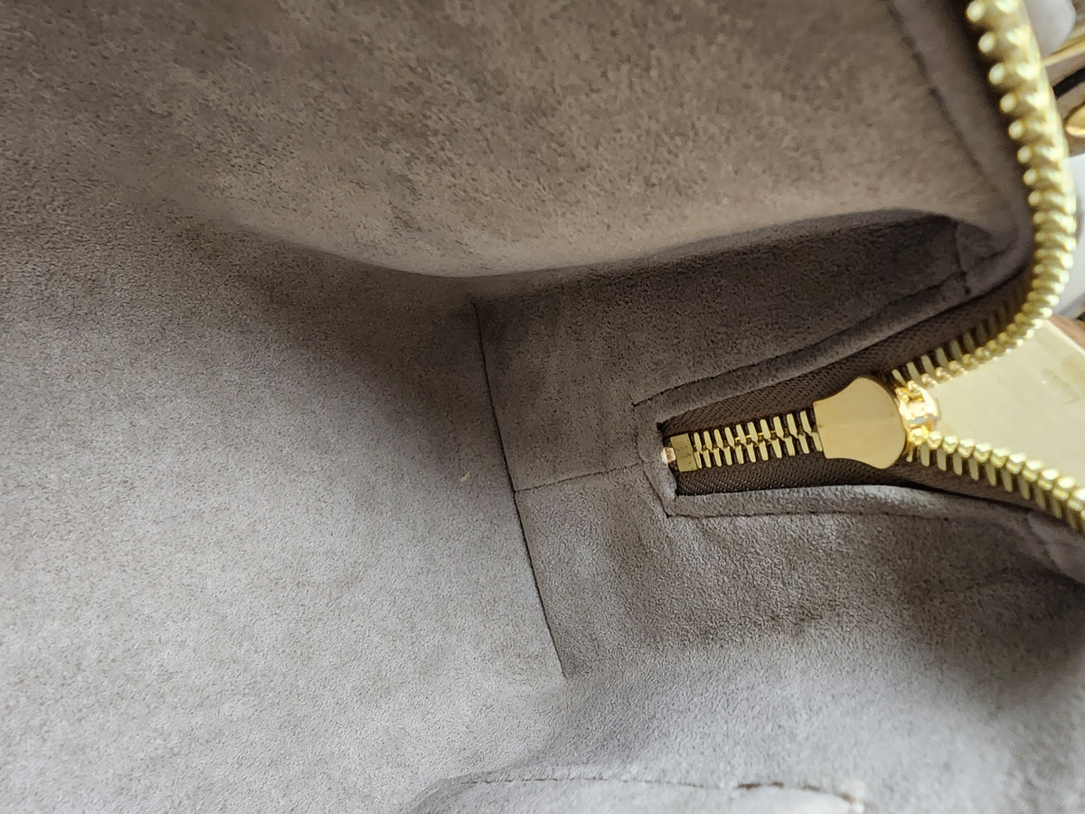 LV Toutrelle / Creme Empreinte On The Go East West