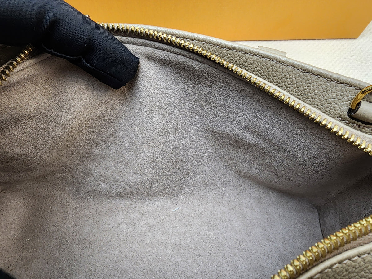 LV Toutrelle / Creme Empreinte On The Go East West