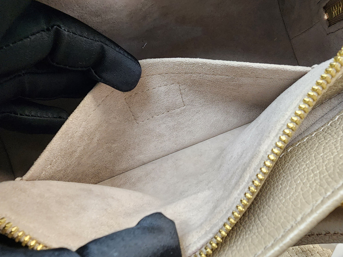 LV Toutrelle / Creme Empreinte On The Go East West