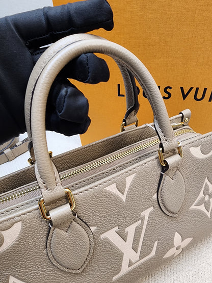 LV Toutrelle / Creme Empreinte On The Go East West