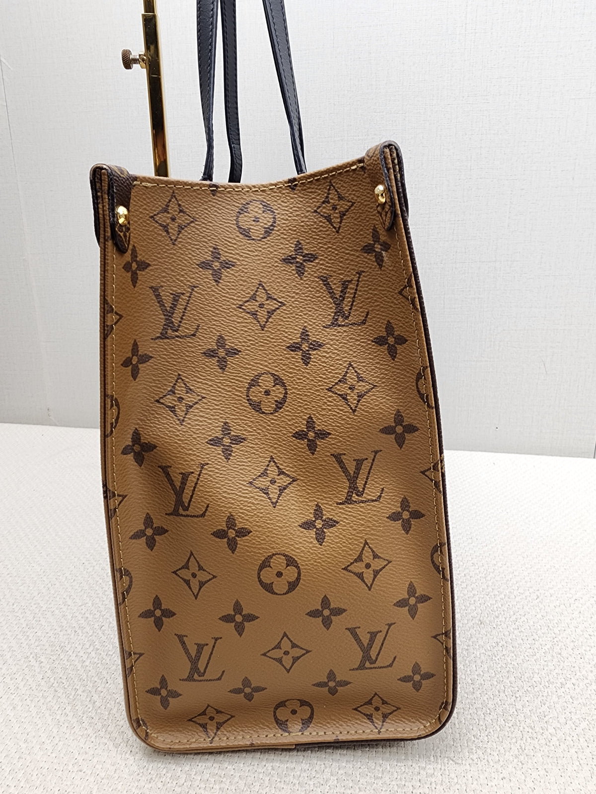 LV Reverse Monogram On The Go MM
