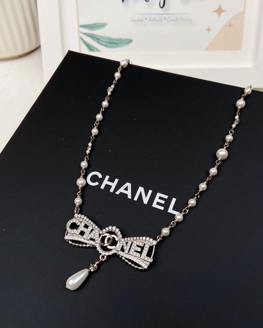 Chanel CC Silver Diamante Bow Pearl Necklace