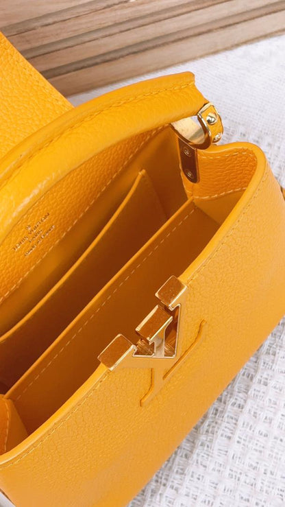 Louis Vuitton Ocre Yellow Taurillon Mini Capucines