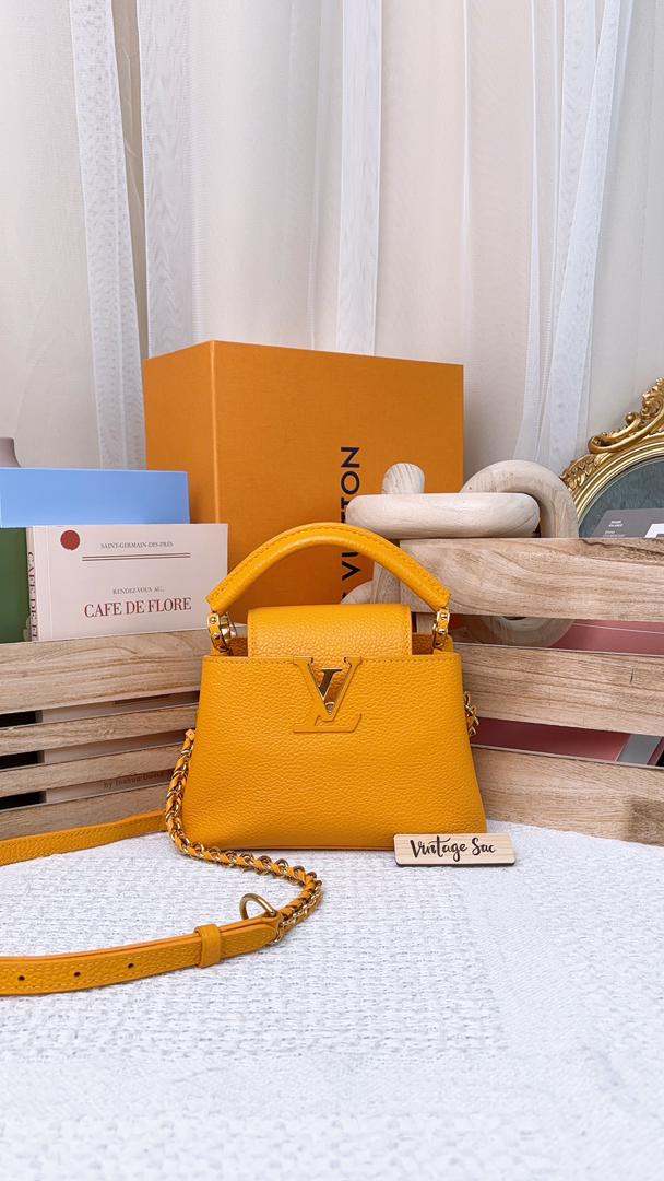 Louis Vuitton Ocre Yellow Taurillon Mini Capucines