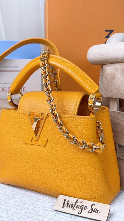 Louis Vuitton Ocre Yellow Taurillon Mini Capucines