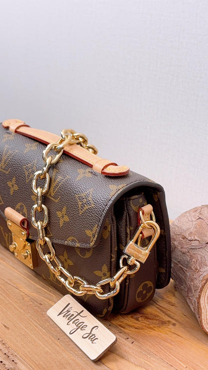 LV Monogram Metis East West