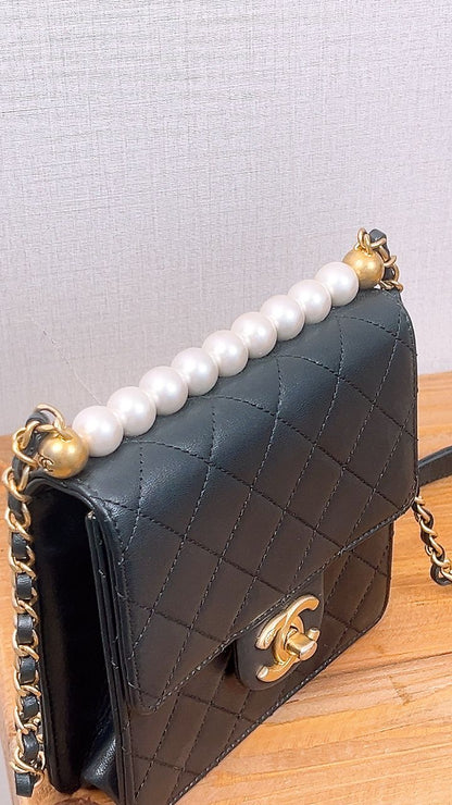 Chanel Black Pearl Vertical Clutch Flap Bag