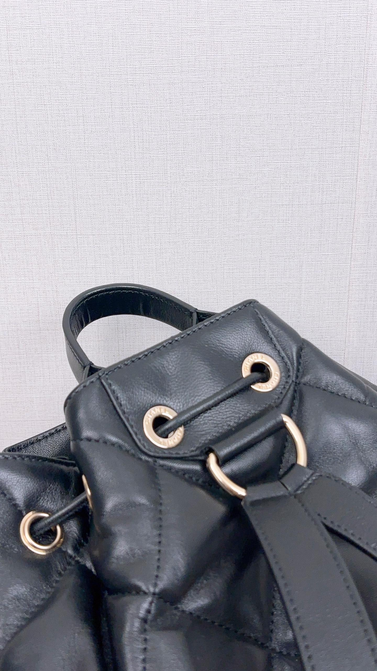 Chanel Black Lambskin Quilted Rucksack Drawstring Backpack (LGHW)