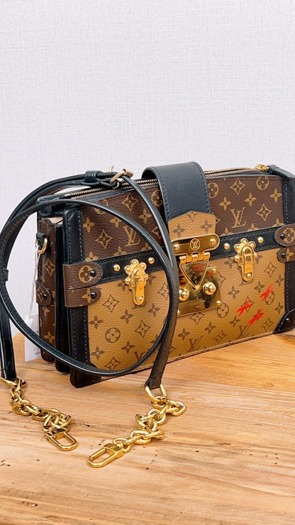 LV Reverse Monogram Trunk Clutch