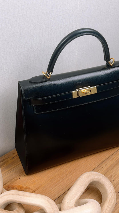 Hermes Noir Box Kelly 32 (GHW)