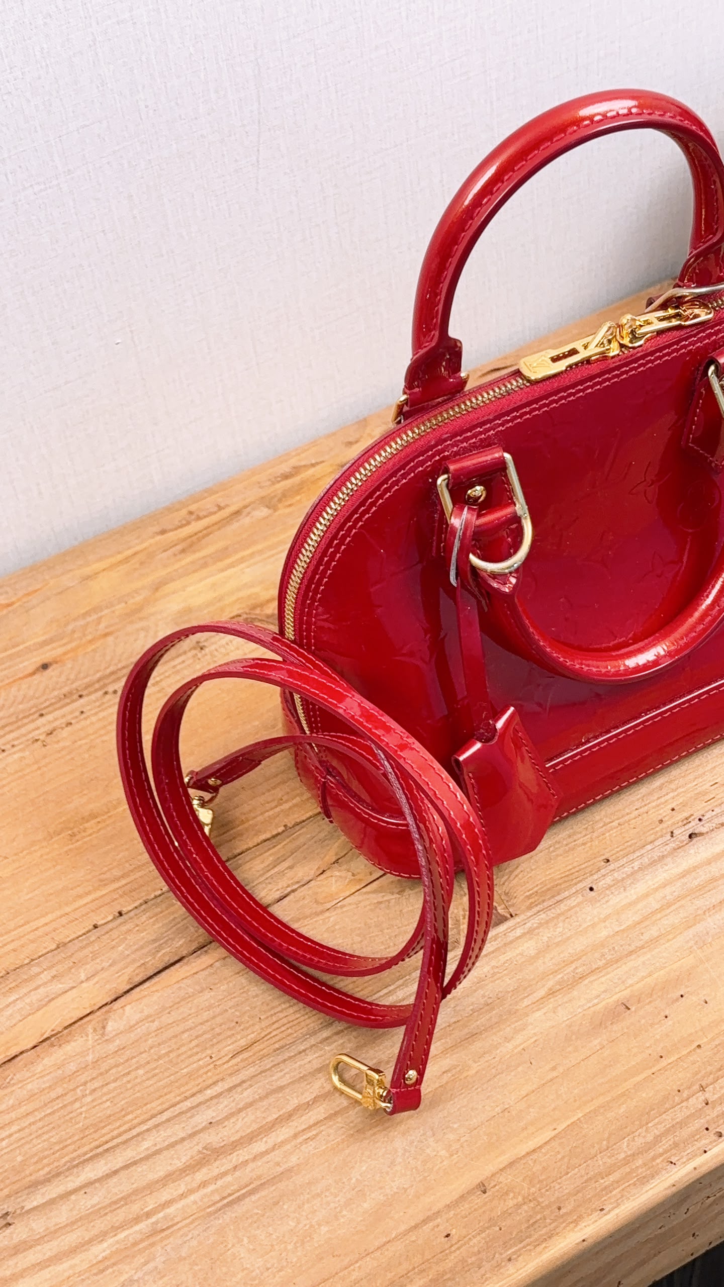 LV Red Vernis Alma BB