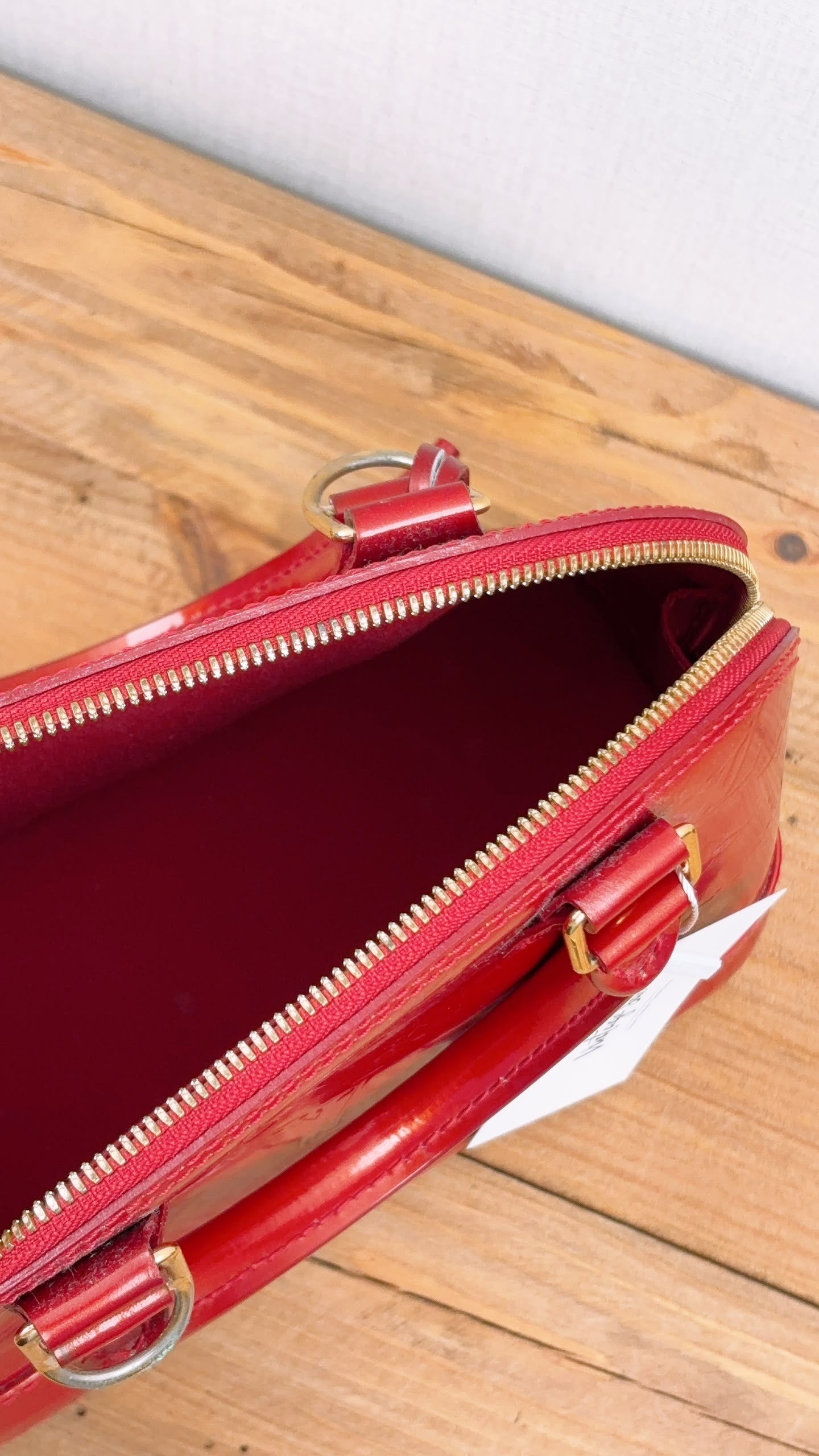 LV Red Vernis Alma BB