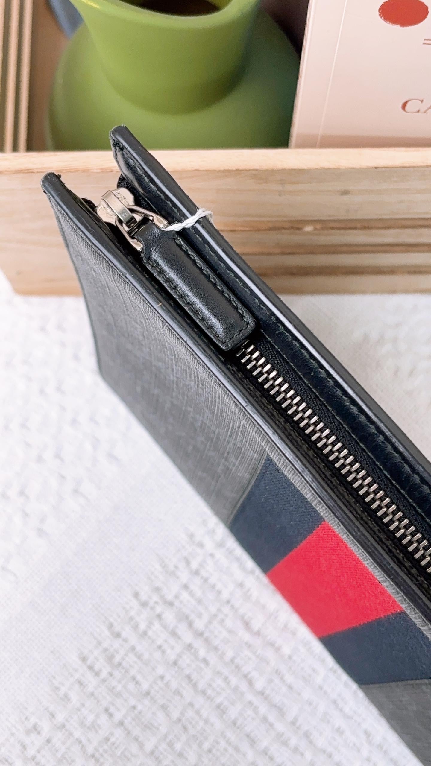 Gucci Black GG Supreme Pouch